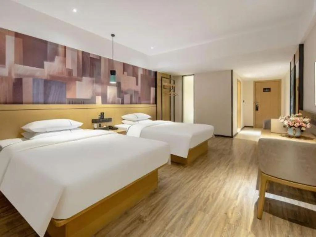 Bed in City Comfort Inn Hezhou Huangyao Ancient Town