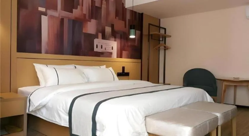 Bed in City Comfort Inn Hezhou Huangyao Ancient Town