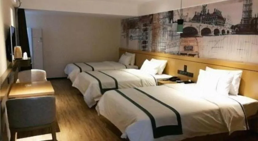 Bed in City Comfort Inn Hezhou Huangyao Ancient Town