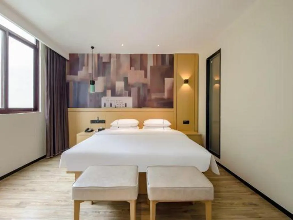 Bed in City Comfort Inn Hezhou Huangyao Ancient Town