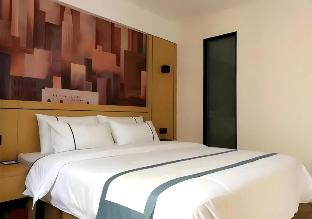 Bed in City Comfort Inn Hezhou Huangyao Ancient Town