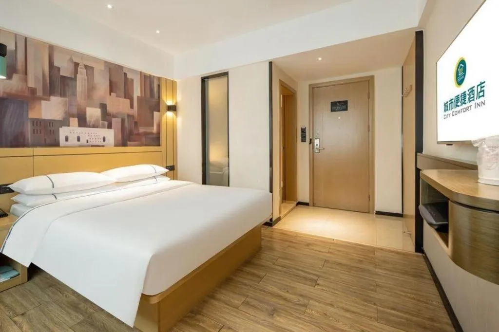 Bed in City Comfort Inn Hezhou Huangyao Ancient Town