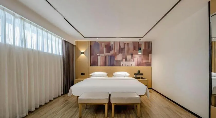 Bed in City Comfort Inn Hezhou Huangyao Ancient Town