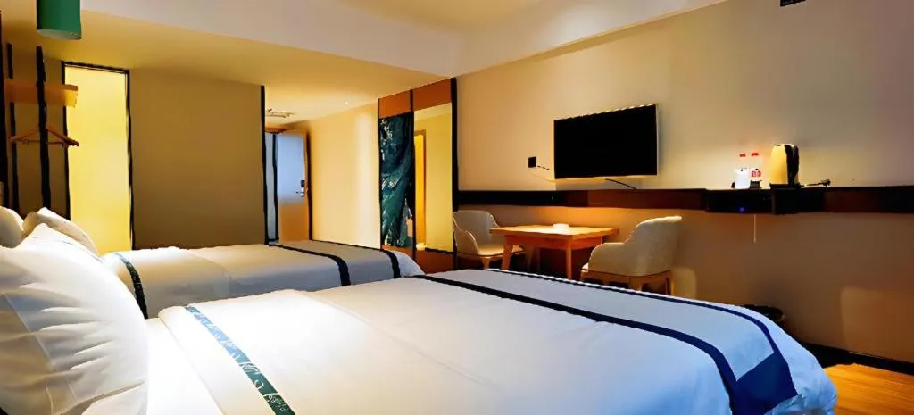 Bed in City Comfort Inn Hezhou Huangyao Ancient Town