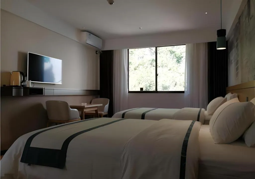 Bed in City Comfort Inn Hezhou Huangyao Ancient Town