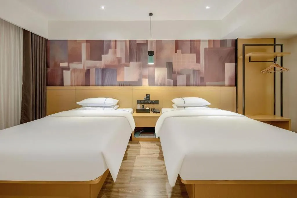 Bed in City Comfort Inn Hezhou Huangyao Ancient Town