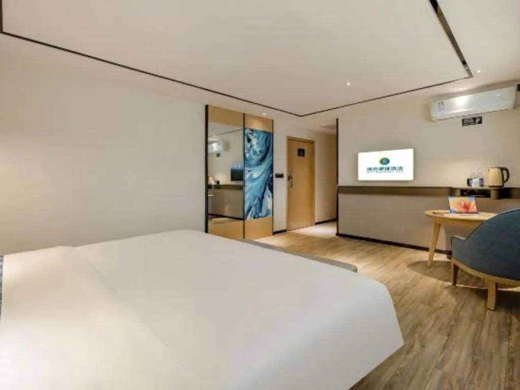 Bed in City Comfort Inn Hezhou Huangyao Ancient Town