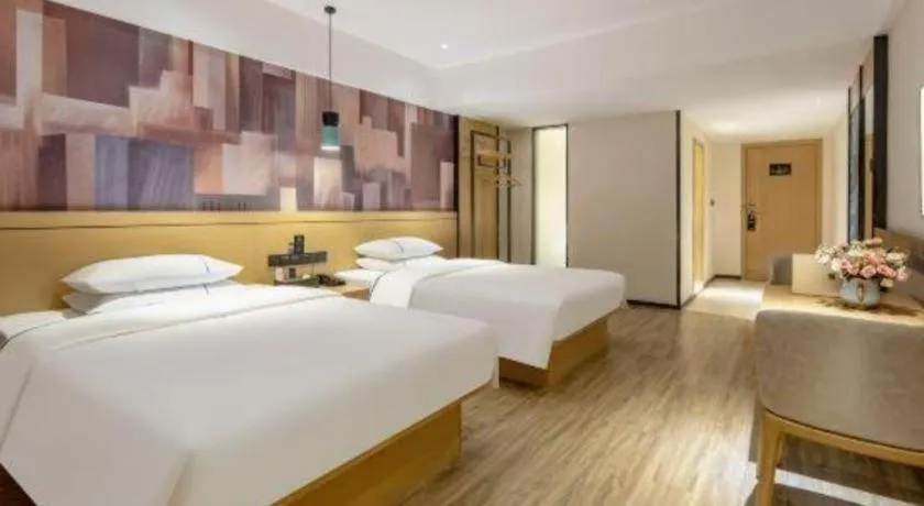 Bed in City Comfort Inn Hezhou Huangyao Ancient Town