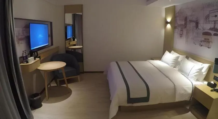 Bed in City Comfort Inn Jinzhou Bohai University Wanda Plaza