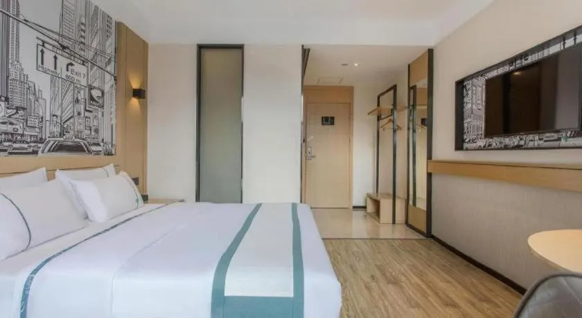 Bed in City Comfort Inn Jinzhou Bohai University Wanda Plaza