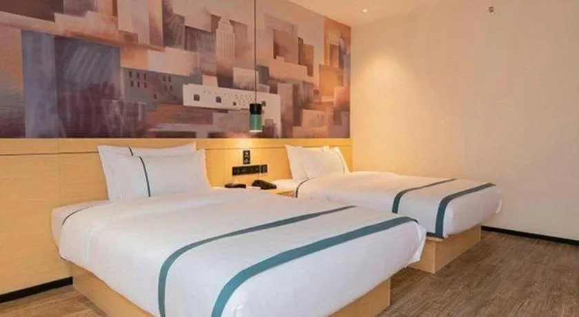 Bed in City Comfort Inn Jinzhou Bohai University Wanda Plaza