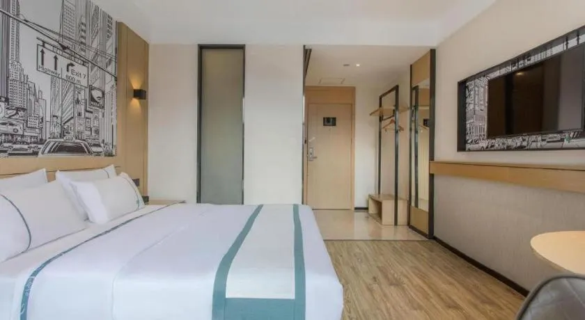 Bed in City Comfort Inn Jinzhou Bohai University Wanda Plaza