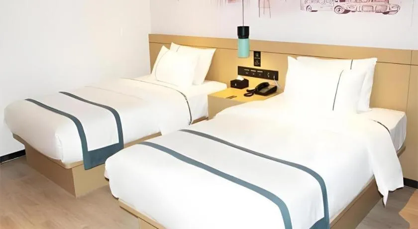 Bed in City Comfort Inn Jinzhou Bohai University Wanda Plaza