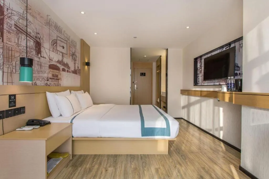 Bed in City Comfort Inn Jinzhou Bohai University Wanda Plaza