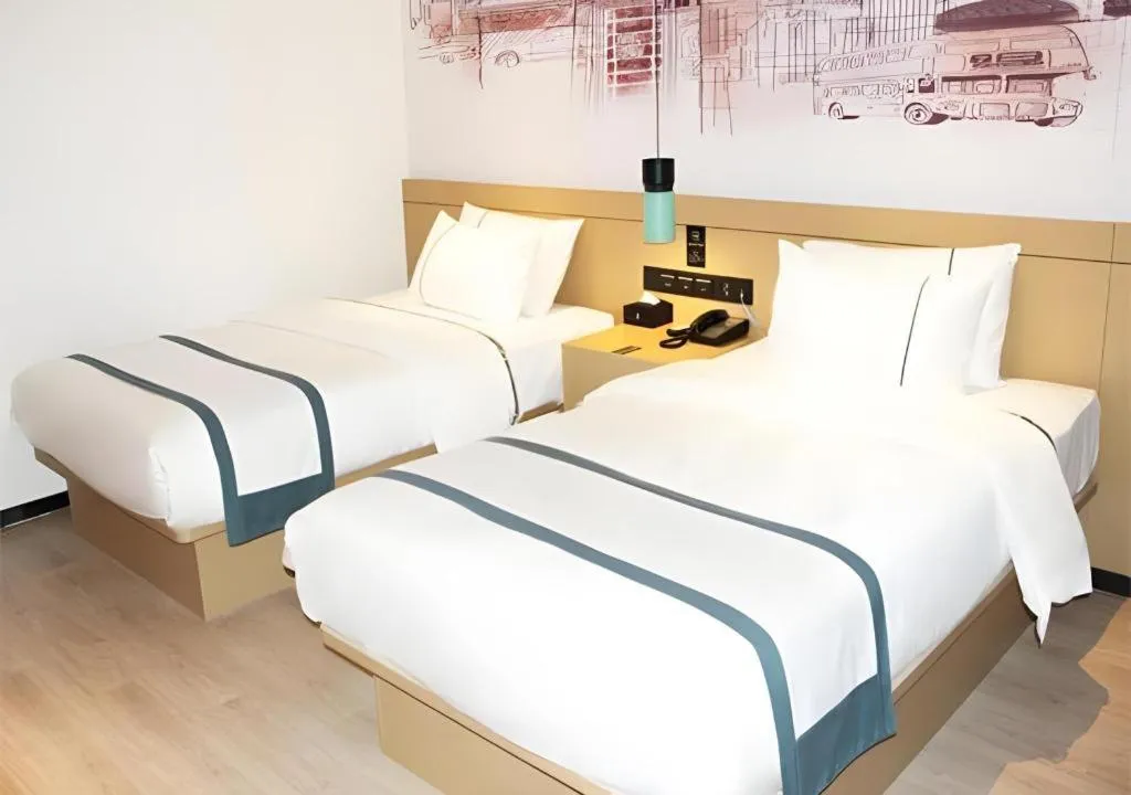 Bed in City Comfort Inn Jinzhou Bohai University Wanda Plaza
