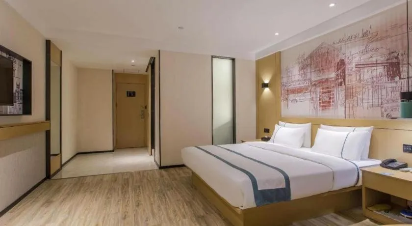 Bed in City Comfort Inn Jinzhou Bohai University Wanda Plaza