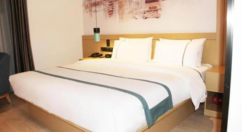 Bed in City Comfort Inn Jinzhou Bohai University Wanda Plaza