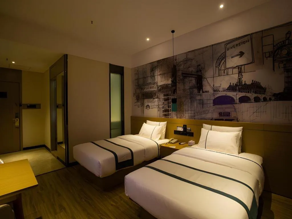 Bed in City Comfort Inn Huanggang Luotian Yishui Waitan