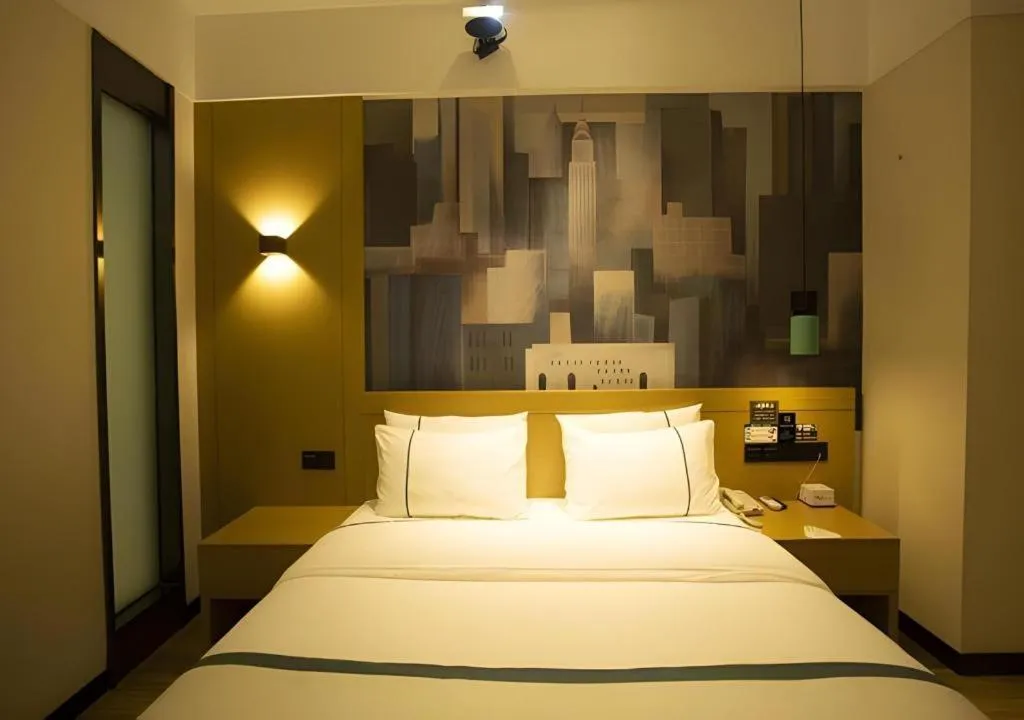 Bed in City Comfort Inn Huanggang Luotian Yishui Waitan