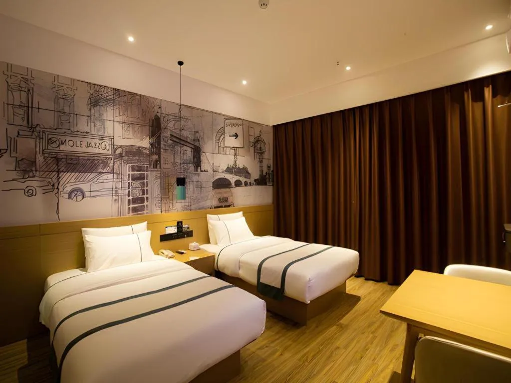 Bed in City Comfort Inn Huanggang Luotian Yishui Waitan