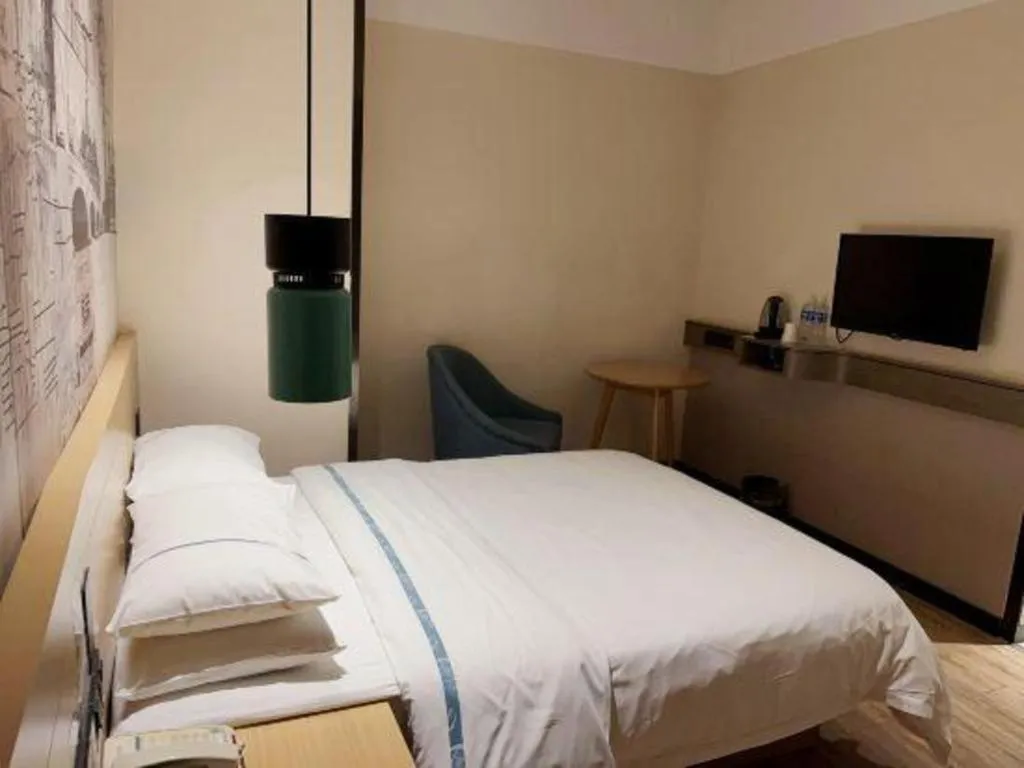 Bed in City Comfort Inn Huanggang Luotian Yishui Waitan