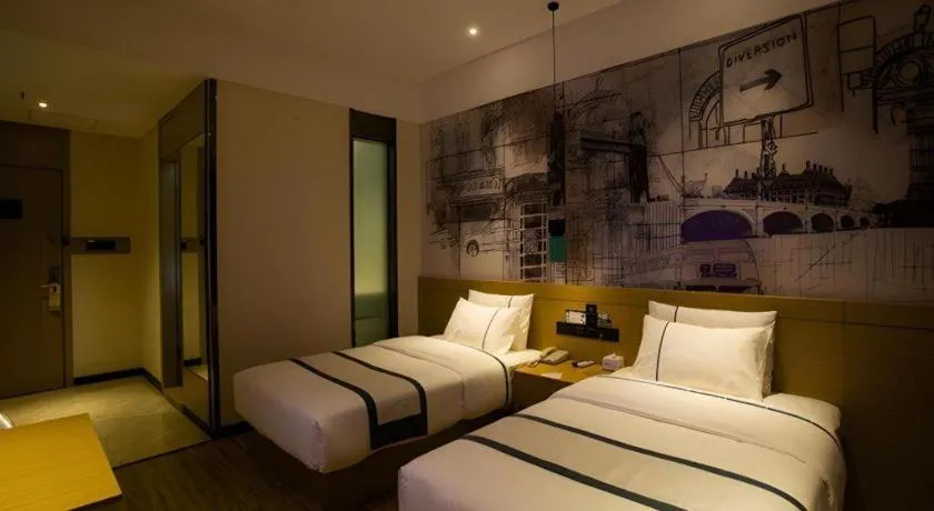 Bed in City Comfort Inn Huanggang Luotian Yishui Waitan