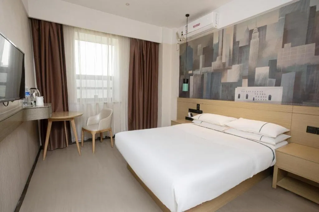 Bed in City Comfort Inn Huanggang Luotian Yishui Waitan