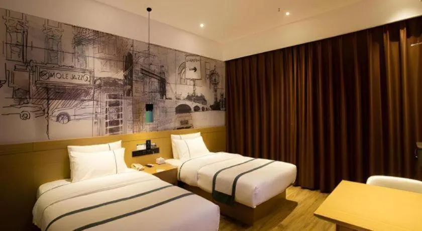 Bed in City Comfort Inn Huanggang Luotian Yishui Waitan