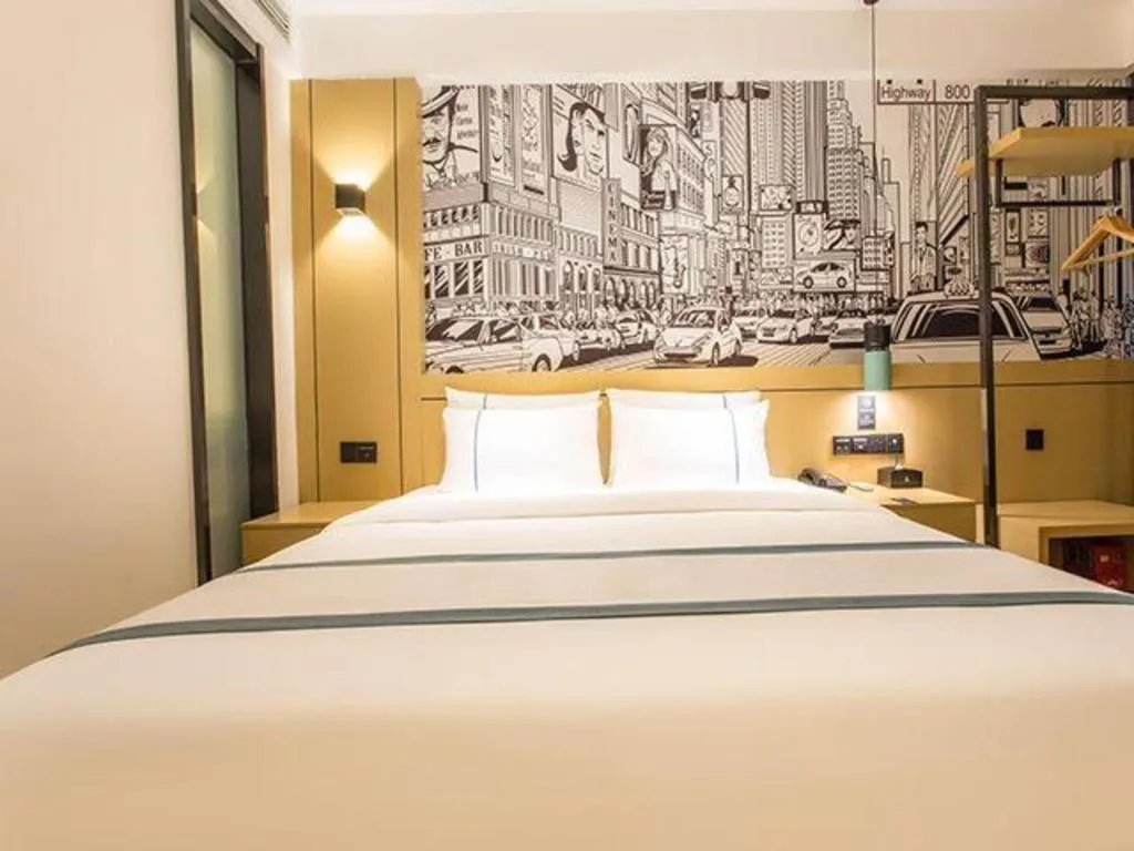 Bed in City Comfort Inn Liuzhou Chengzhong Wanda Haiguan