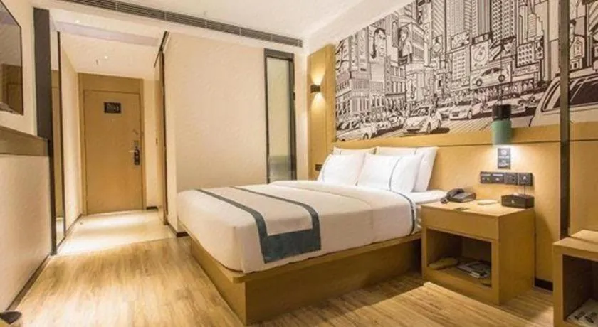 Bed in City Comfort Inn Liuzhou Chengzhong Wanda Haiguan