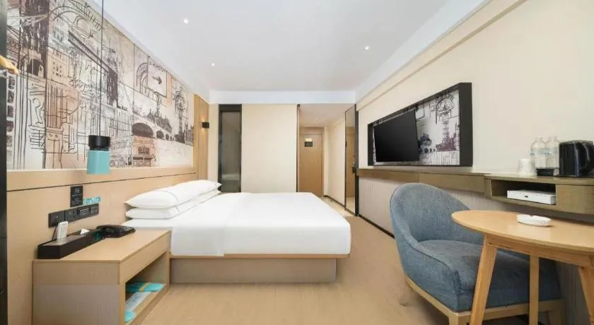 Bed in City Comfort Inn Liuzhou Chengzhong Wanda Haiguan