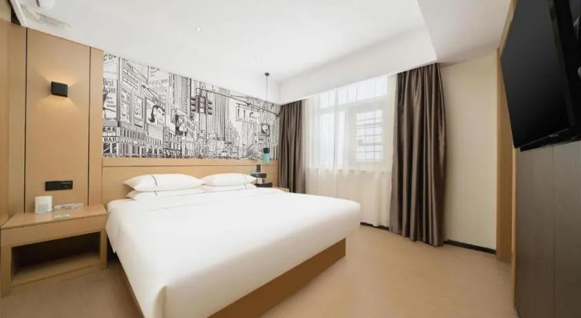 Bed in City Comfort Inn Liuzhou Chengzhong Wanda Haiguan