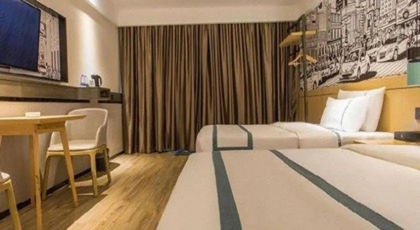 Bed in City Comfort Inn Liuzhou Chengzhong Wanda Haiguan