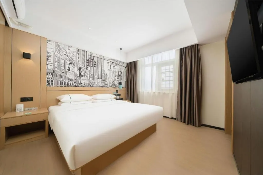 Bed in City Comfort Inn Liuzhou Chengzhong Wanda Haiguan