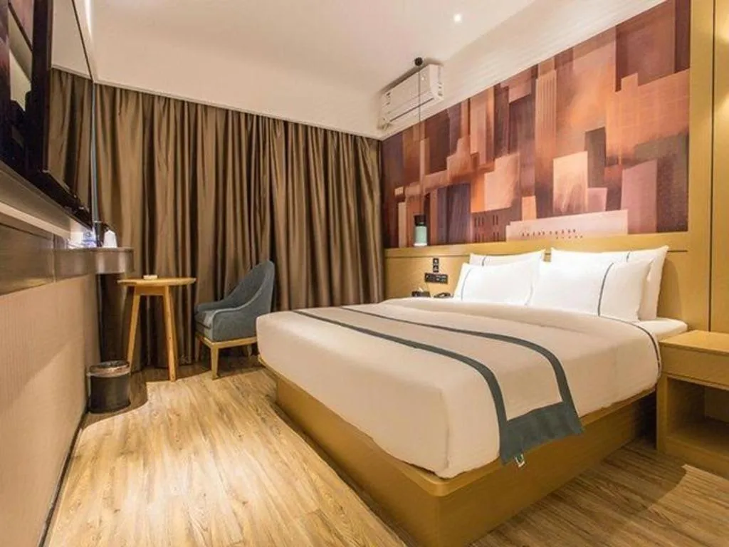 Bed in City Comfort Inn Liuzhou Chengzhong Wanda Haiguan