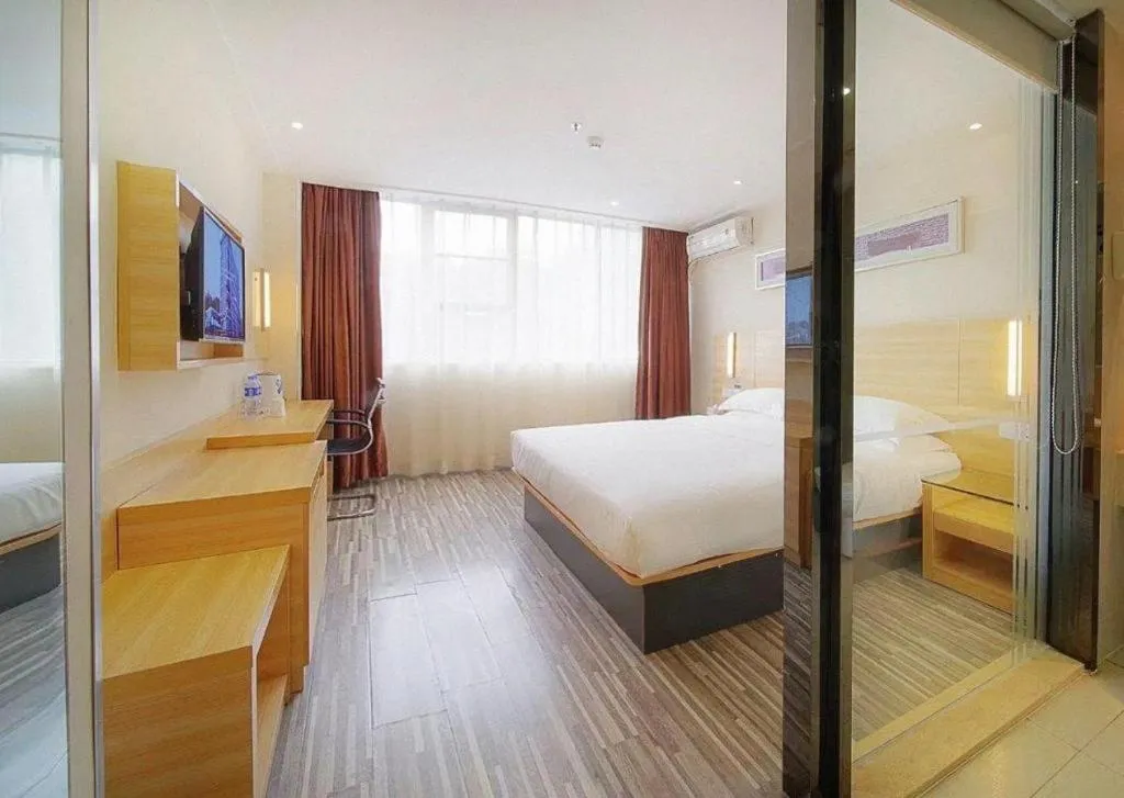 Bed in City Comfort Inn Zhongshan Dongsheng One Plus One