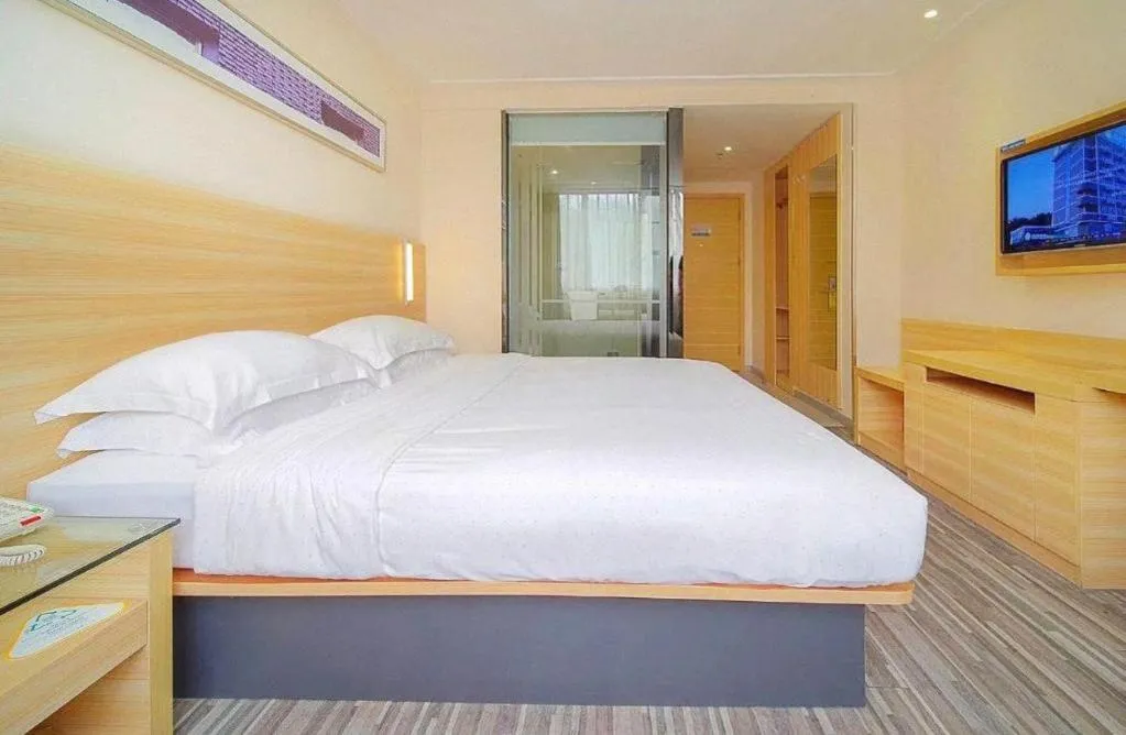 Bed in City Comfort Inn Zhongshan Dongsheng One Plus One