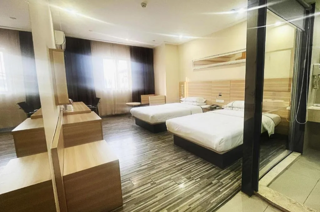 Bed in City Comfort Inn Zhongshan Dongsheng One Plus One