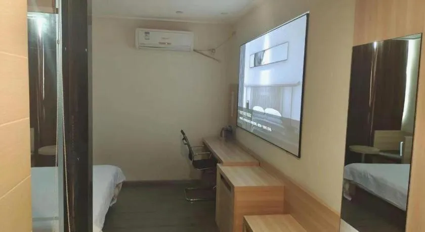 Bed in City Comfort Inn Zhongshan Dongsheng One Plus One