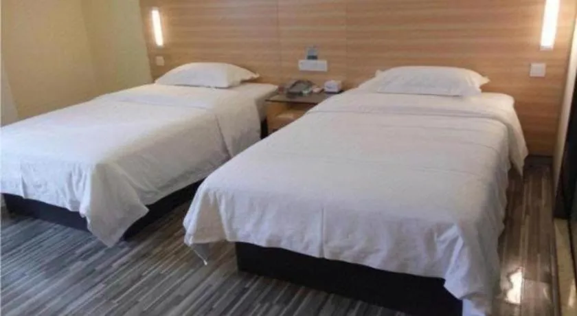 Bed in City Comfort Inn Zhongshan Dongsheng One Plus One