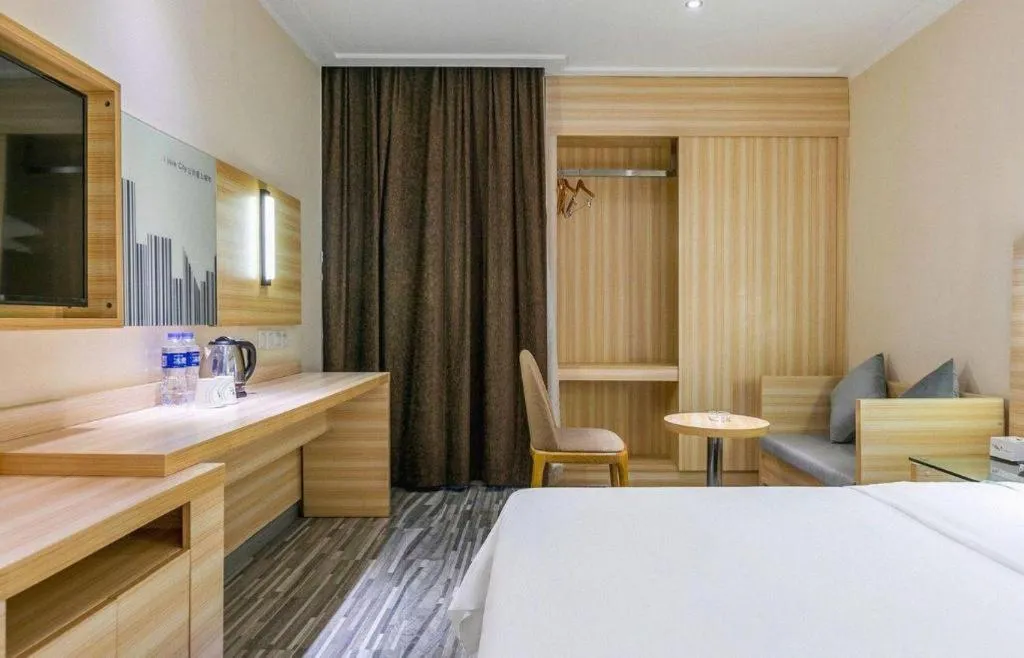 Bed in City Comfort Inn Zhongshan Dongsheng One Plus One