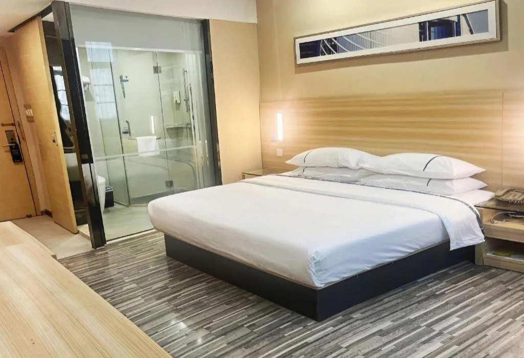 Bed in City Comfort Inn Zhongshan Dongsheng One Plus One