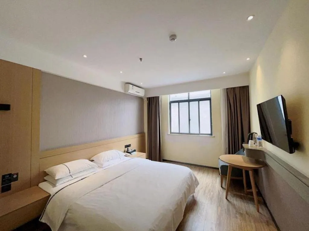 Bed in City Comfort Inn Jiangxia Wuchang University of Technology