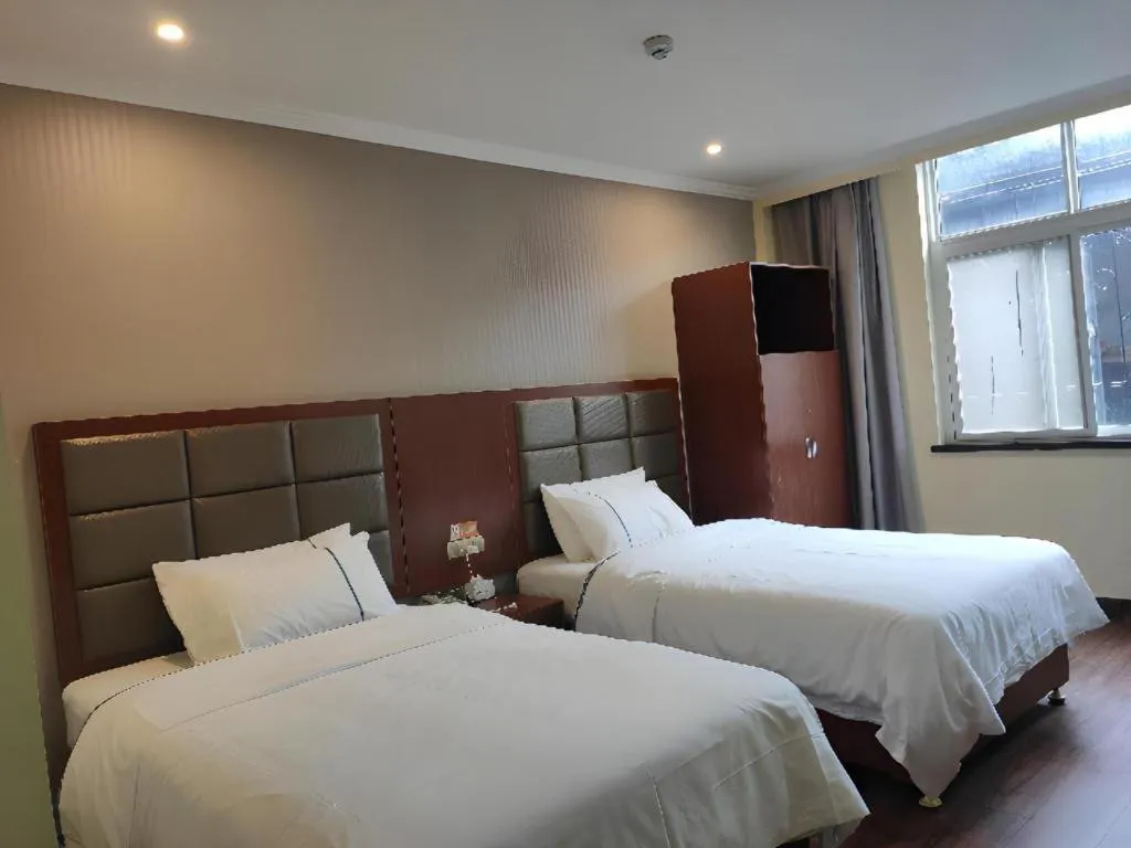 Bed in City Comfort Inn Jiangxia Wuchang University of Technology