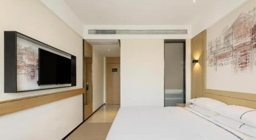 Bed in City Comfort Inn Jiangxia Wuchang University of Technology