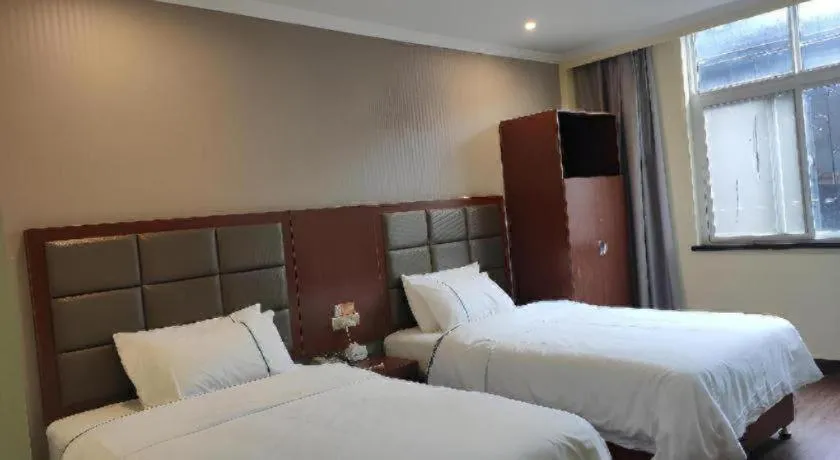 Bed in City Comfort Inn Jiangxia Wuchang University of Technology