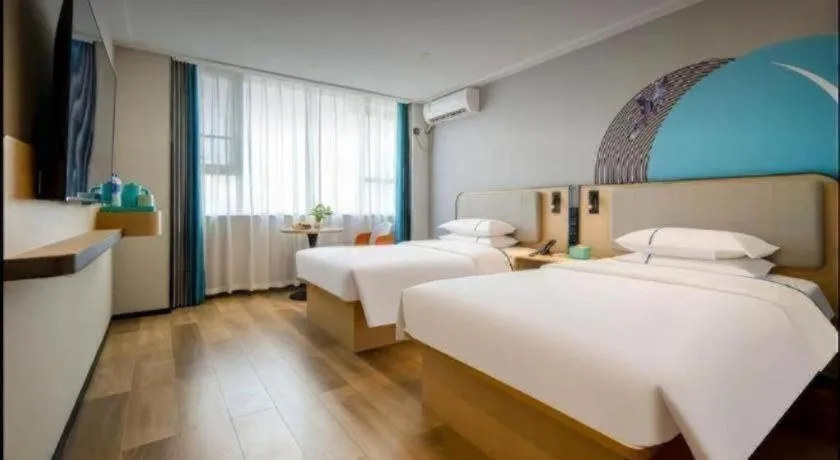 Bed in City Comfort Inn Jiangxia Wuchang University of Technology