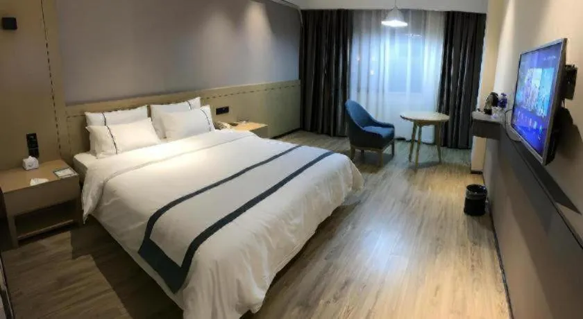 Bed in City Comfort Inn Jiangxia Wuchang University of Technology