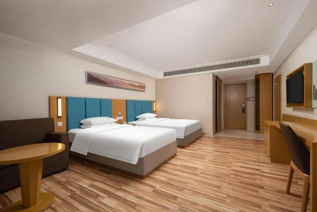 Bed in City Comfort Inn Jingzhou Wanda Plaza