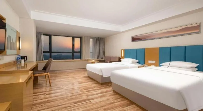 Bed in City Comfort Inn Jingzhou Wanda Plaza